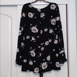 Black Jumper with floral pattern.